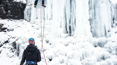 Person ice climbing