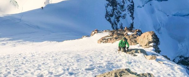 Mountaineer on the summit slope of the Jungfrau.