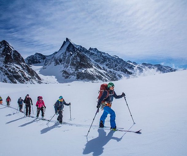 Ski tourers ascending to the Lötschenlücke.