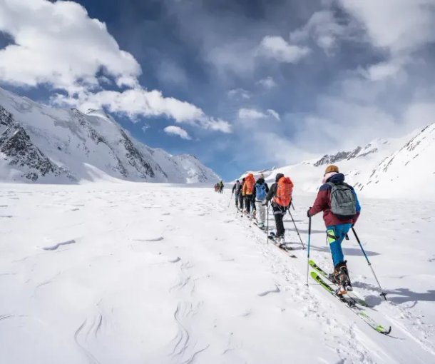 Ski tourers ascending to the Lötschenlücke.