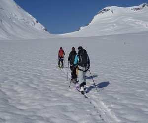 Ski tourers ascending to the Lötschenlücke.
